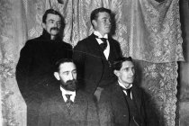 4 men by flash light